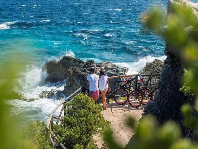 Explore the island by bike or golf cart
